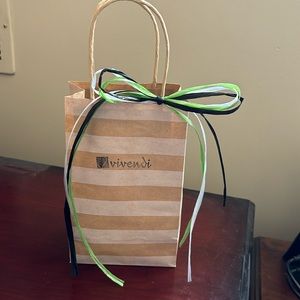 18 karat gold plated charm on a 14 karat gold cable chain. Size 16in length